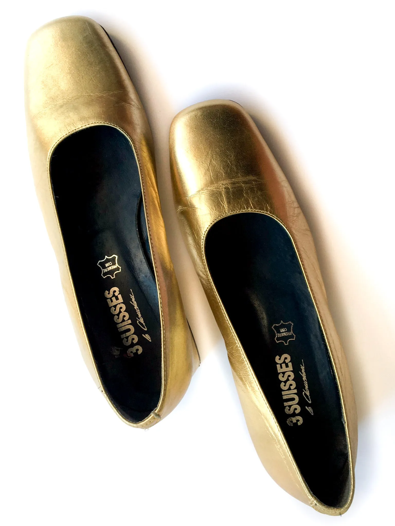 90s vintage gold lamé pumps.