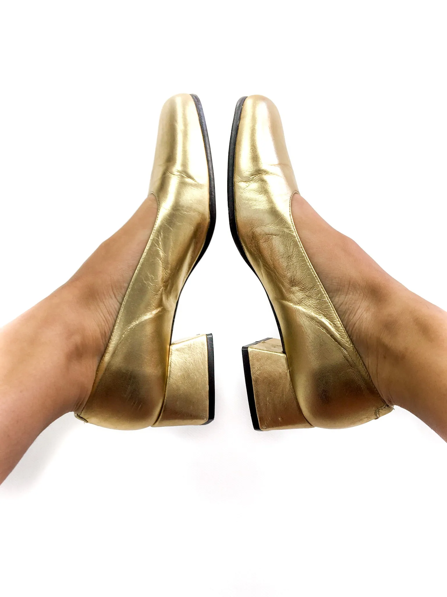 90s vintage gold lamé pumps.