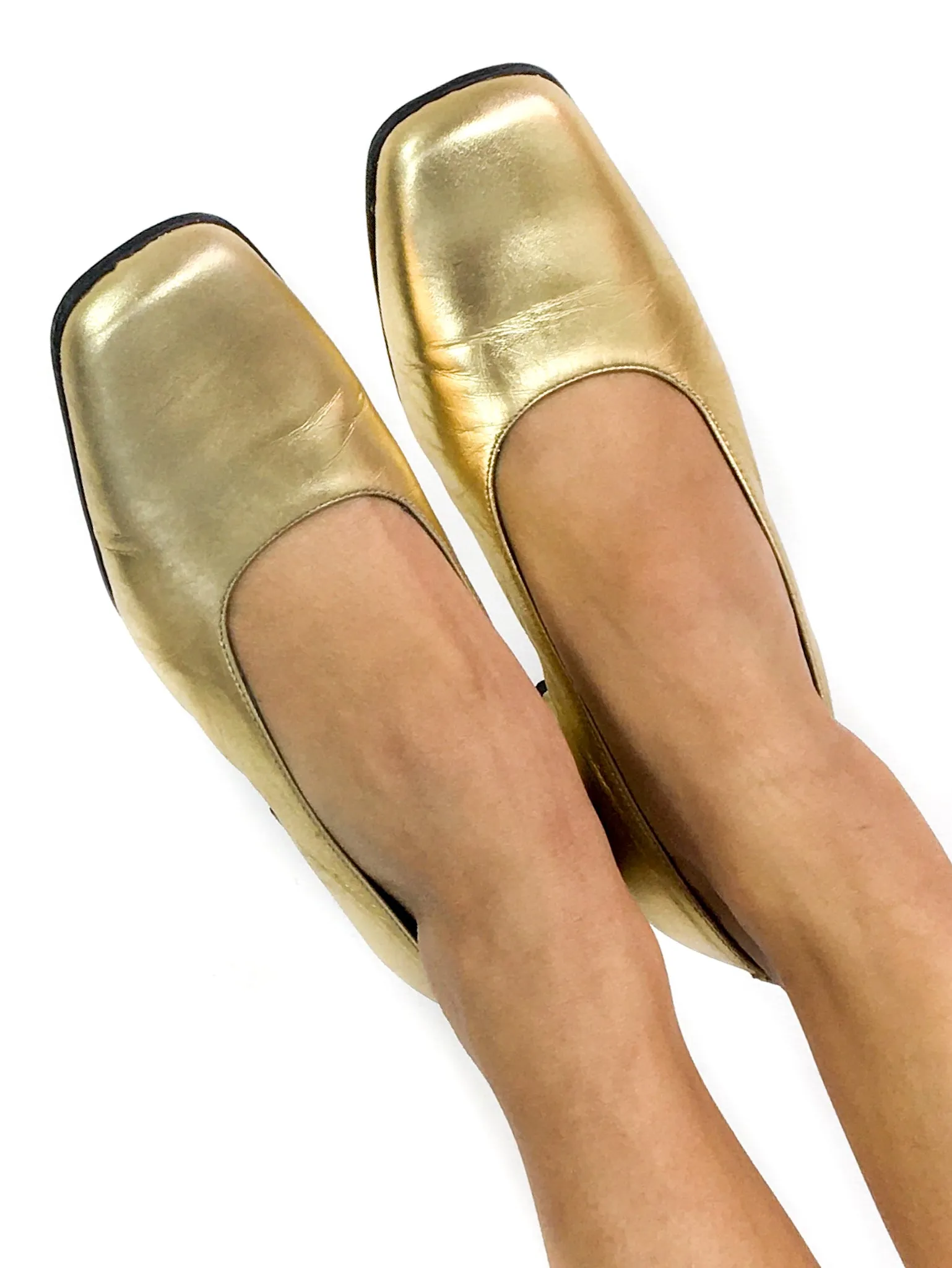 90s vintage gold lamé pumps.