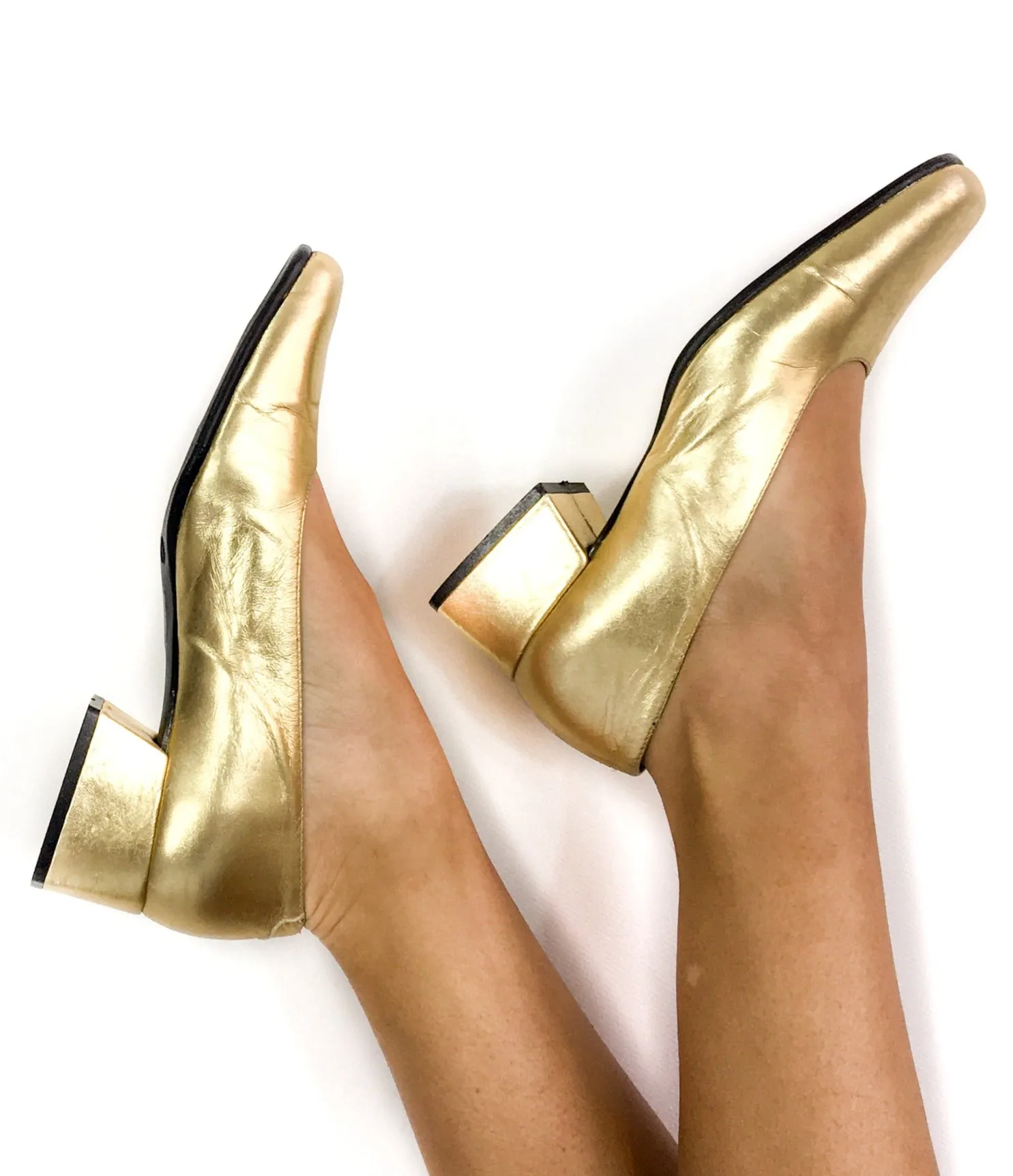 90s vintage gold lamé pumps.